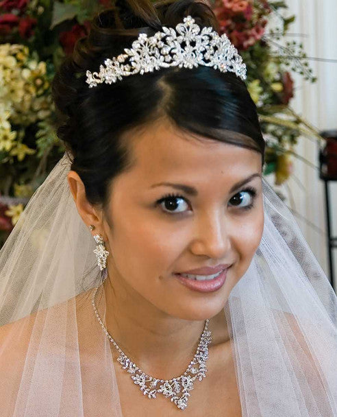 A BRIDAL/WEDDING HEADBAND Encrusted With Crystals and Pearl